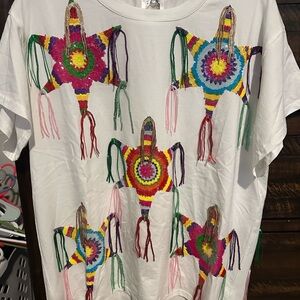 Queen of sparkles piñata shirt.